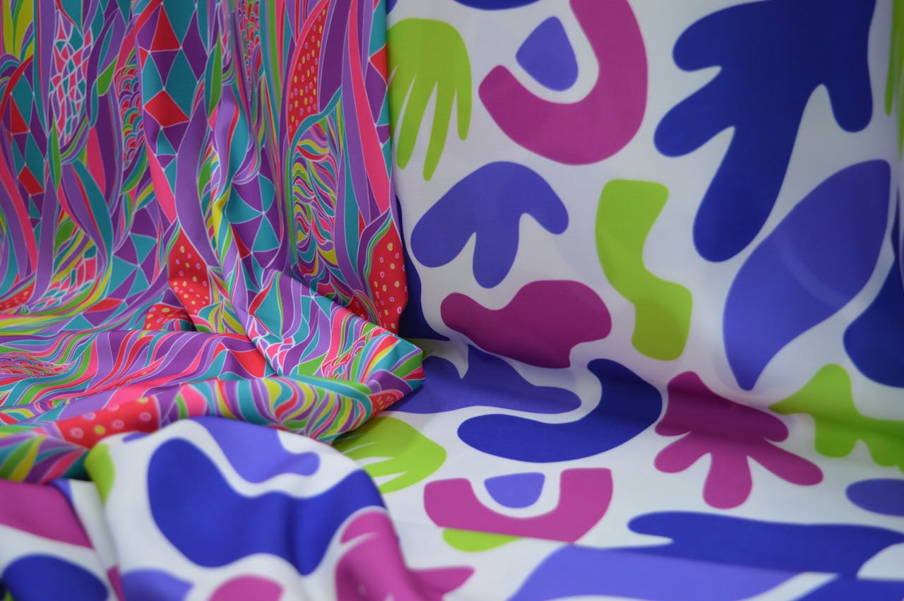 Vibrant abstract fabric patterns featuring bold shapes and colors ideal for creative design projects.